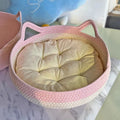 The AeroNest™ Handwoven Rattan Cat Bed — Summer Cooling with Removable Cushion & Scratch Pad